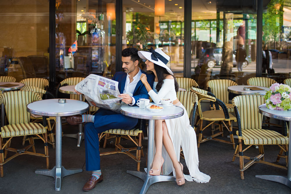 Cute couple in Parisian café - romantic engagement pictues in Paris