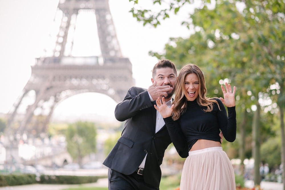 Fun photo of a couple at the Eiffel Tower