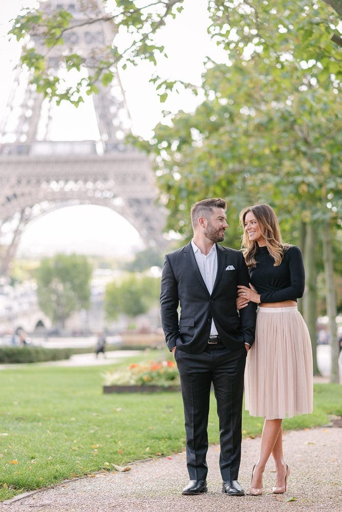 Fine art portrait of an elegant couple in Paris France at the Eiffel Tower